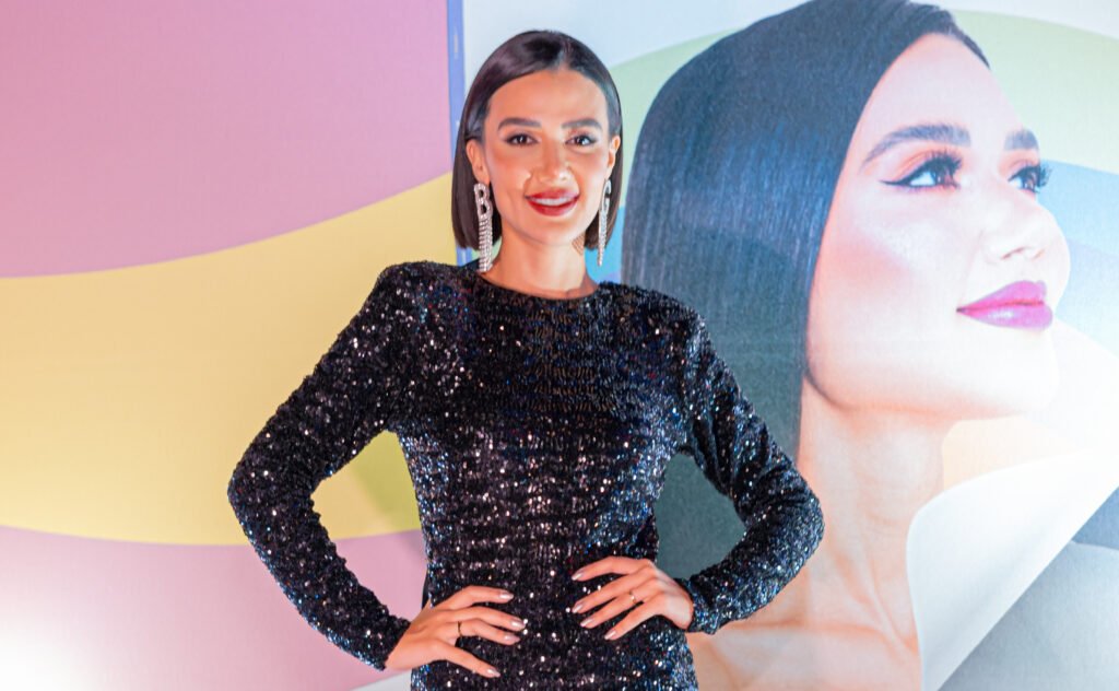 Bel Guerra no evento de lançamento do livro "Do preto e branco ao colorido" Divulgação